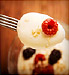 berry and yogurt on spoon